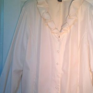 An eggshell colored Ellen Tracy long sleeve blouse size 18